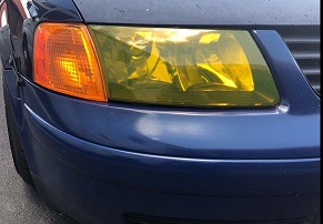 Car front light covered in vinyl